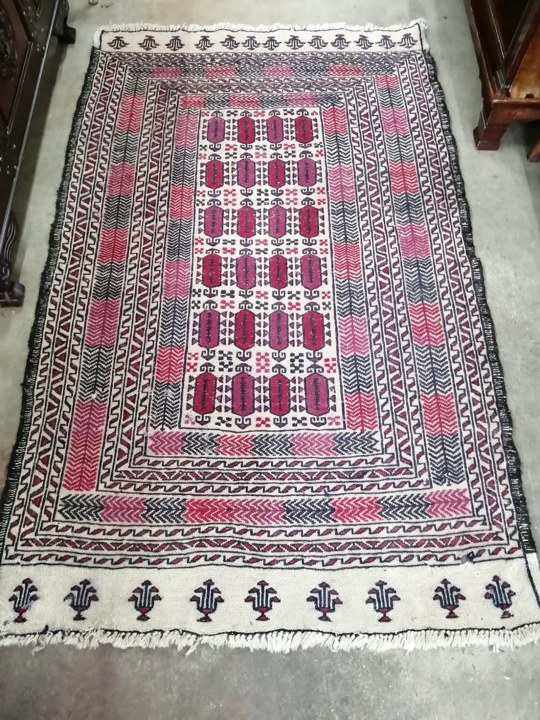 A flat weave rug, 180 x 110cm